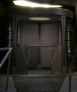 An exposed turbolift car on starbase Deep Space 9