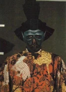 Betelgeusian chief ambassador, set still.jpg (34 KB) Chief Ambassador Red, black, silver and gold brocade woven with leopards and falcons, with real gold and silver wrapped around silk thread.