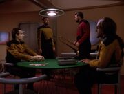 Thomas Riker and William Riker play poker with Data and Worf