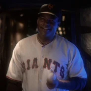 Willie Hawkins wearing Giants cap