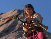 , a Mintakan, with a bow and arrow