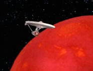 The Enterprise enters orbit of Excalbia