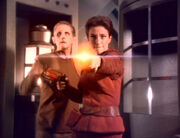 Kira and Odo fight the Hunters