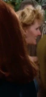 At the Farpoint Station mall Played by an unknown actress (TNG: "Encounter at Farpoint")