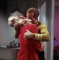 James Kirk forcefully grabs Janice Rand