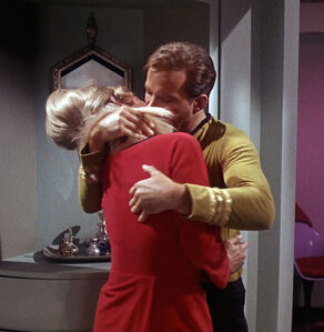 James Kirk forcefully grabs Janice Rand