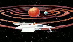A planet with a moon and a ring system in the Beta Lyrae system