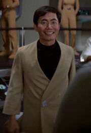 Sulu wearing wraparound tunic, mid 2270s