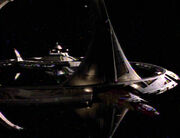 Wadi-Bajoran-Trill starship in docking bay