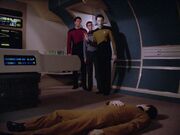 Lore, Riker, and Wesley Crusher find Data unconscious