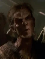 Peak-eared alien prisoner