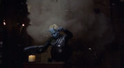 Shran knocked to the ground by an explosion