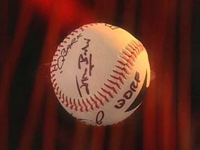 A baseball, autographed by the Niners.