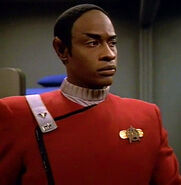 Tuvok wearing a gray collar, denoting a science officer in the 2290s