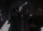 Starfleet officers evacuating Deep Space 9