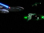 USS Enterprise-D and Romulan warbird contend for a Romulan scout ship