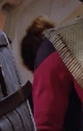 In a corridor Played by an unknown actress (TNG: "Heart of Glory")