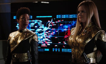 Burnham and Tilly dressed in Terran uniforms