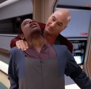 Jean-Luc Picard performing a Vulcan nerve pinch on Devor