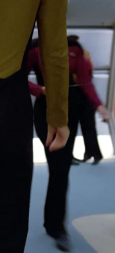 In a corridor Played by an unknown actress (TNG: "The Naked Now")