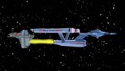 USS Enterprise tows robot grain ship