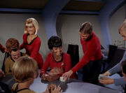 Uhura giving away tribbles