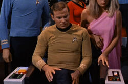 James Kirk sits in the updated chair with viewer removed in 2266