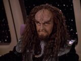 K'mtar, an alias of Alexander Rozhenko from the future, a Klingon (1994).