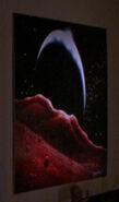 A painting in the observation lounge, guest, and Marla Aster's quarters (TNG: "Where Silence Has Lease", "Loud As A Whisper", "Unnatural Selection", "The Royale", "Time Squared", "The Icarus Factor", "Pen Pals", "Q Who", "Samaritan Snare", "Up The Long Ladder", "The Emissary", "Peak Performance", "Evolution", "The Survivors", "The Bonding", "Booby Trap", "The Price", "The Defector", "Deja Q", "Tin Man", "Transfigurations", "The Best of Both Worlds")