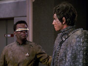 Bochra and La Forge covered in mud