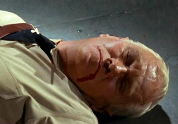 Captain Kirk tries to revive Gill in the Ekosian capital