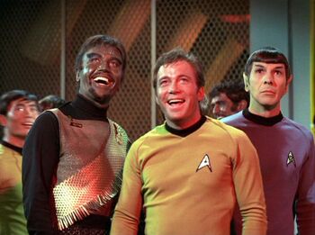 Kang, Sulu, Kirk, Spock in engineering