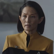 Comodoro Oh, Directora de Seguridad de la Flota Estelar para el 2399, ademas era la agente del Zhat Vash infiltrada en la Flota Estelar