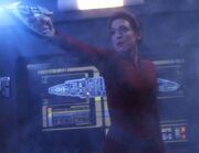 Major kira fighting off the Jem'Hadar in front of Defiant's MSD