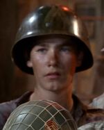 Only boy in metal helmet