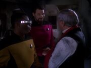 Geordi La Forge and William Riker greet Montgomery Scott