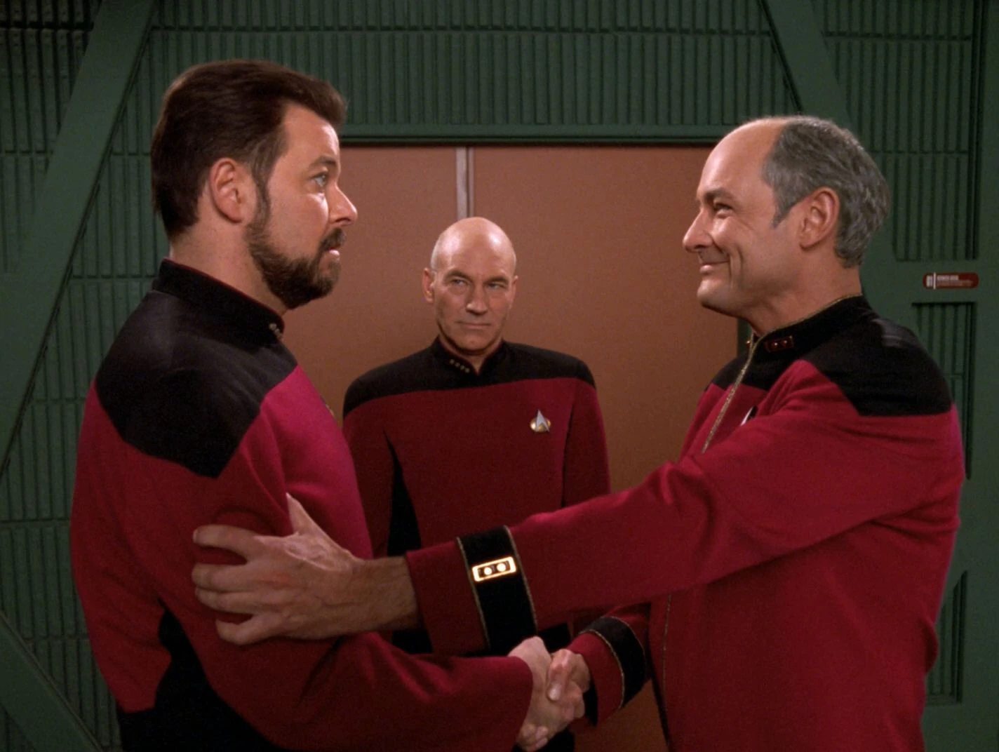 Erik Pressman greets William T. Riker