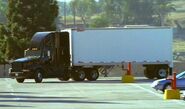 A semi-truck with trailer, 1996.