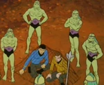 Aquan guards surround Spock and Kirk