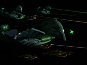 Cardassian and Romulan fleet open fire