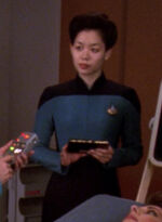 Nurse in sickbay, early 2370