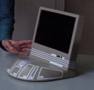 A grey monitor in Beverly Crusher's office
