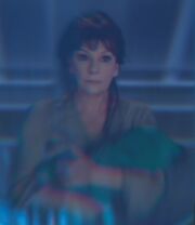 Deanna holding Thaddeus, 2381