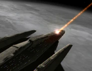 Reptohumanoid vessel firing covariant phaser pulse.jpg (66 KB) A covariant phaser pulse impacts through the deflector shields of an alien ship