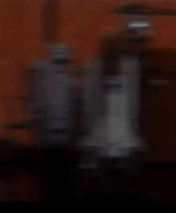 Two space shuttle models in his office