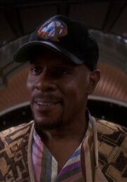 Sisko wearing baseball cap