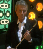 Vic Fontaine holds Nog's old cane
