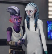 Gwyn dressed in patient attire.jpg (229 KB) Gwyn in a sickbay patient outfit aboard the Protostar