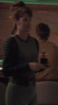 Played by an unknown actress (TNG: "Ensign Ro", "A Matter Of Time", "Time's Arrow")