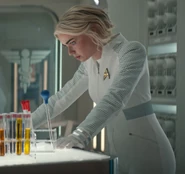 Christine Chapel wearing gloves.png (387 KB) Nurse Chapel wearing gloves in laboratory